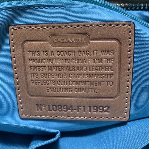 COACH 
•Sateen Leather 
•Gold outside 
•Blue interior 
•Satchel Handbag
•F11992 - Picture 6 of 6